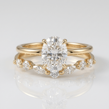 Conjunto de joias Rose & Oliver com anéis de ouro ovalados e diamantes marquise, detalhes elegantes e brilho sofisticado