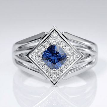Anel de prata com estrela e safira azul, design elegante da marca Rose & Oliver, mostrando detalhes da joia.