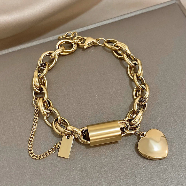 Bracelete chunky dourado da Rose & Oliver, estilo robusto com acabamento elegante, ideal para acessórios de moda.