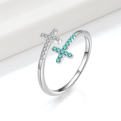 Anel duplo cruzado em turquesa e prata ajustável da Rose & Oliver, com detalhes elegantes e acabamento refinado.